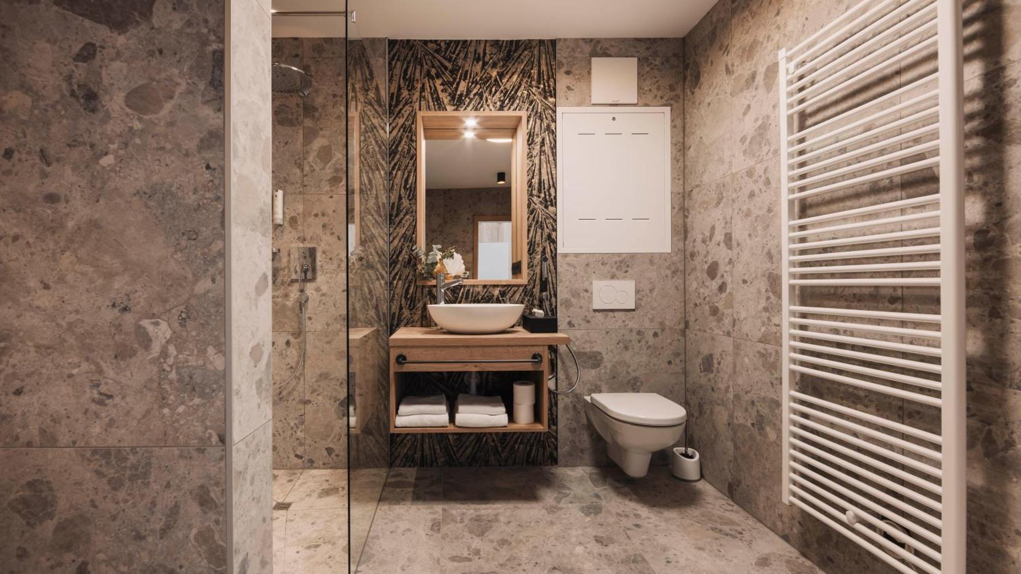 Triple A Chalets เซเฟลด์ อิน ทิโรล ภายนอก รูปภาพ
